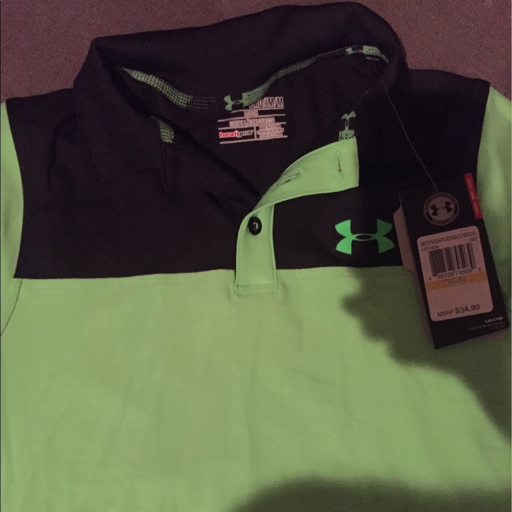 Under armour polo black & green. Youth medium.